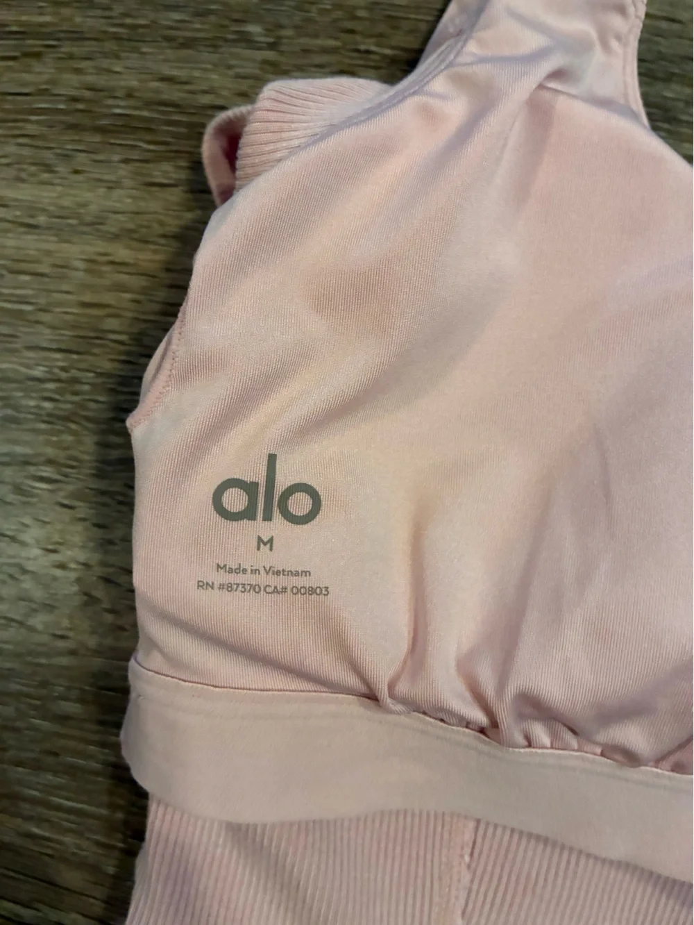 ALO Yoga Cold-Shoulder Cropped Ribbed Long Sleeve Top in Ballet Pink Size Medium